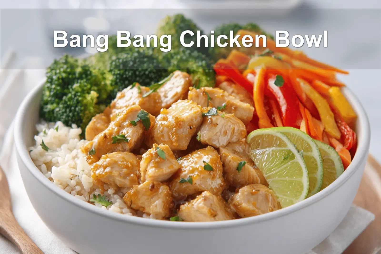 Bang Bang Chicken Bowl Irresistible Flavor Explosion 3 Bang Bang Chicken Bowl with tender-cooked chicken pieces rice cauliflower rice vegetables zesty creamy sauce lime
