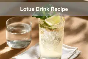 Lotus Drink Recipe in a clear glass with vibrant colors and fresh garnish