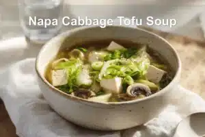 Napa Cabbage Tofu Soup bowl with tender tofu napa cabbage mushrooms and warm savory broth