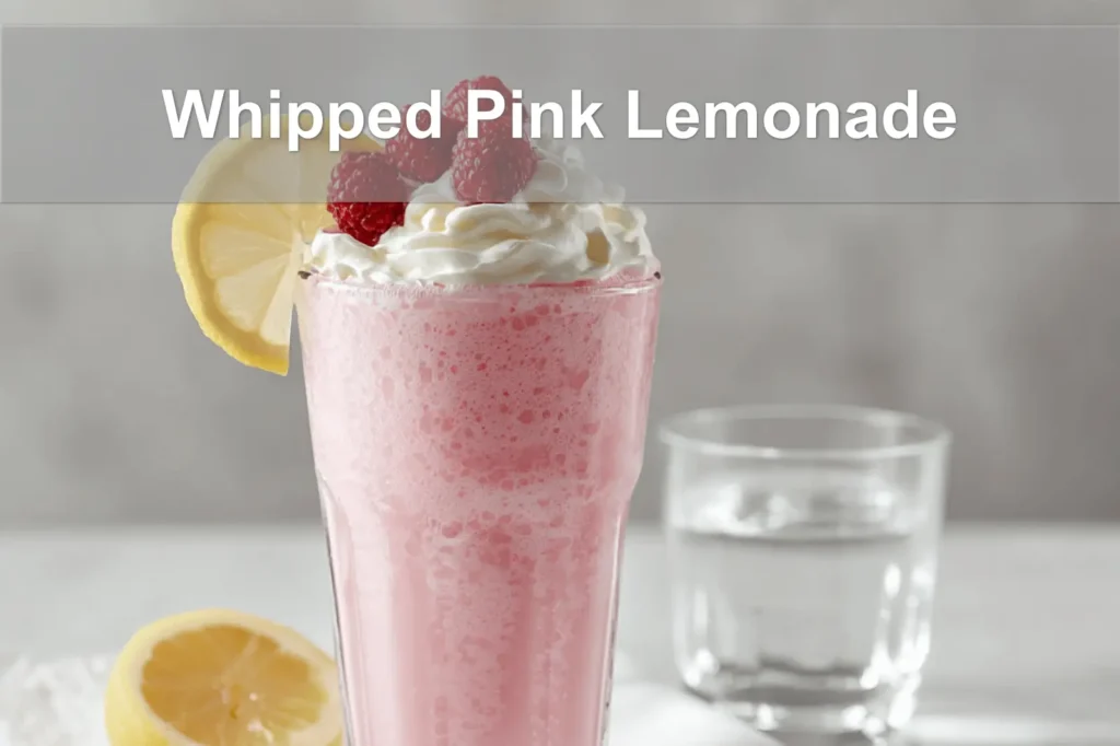 Whipped Pink Lemonade served with cream and raspberries to beat the heat