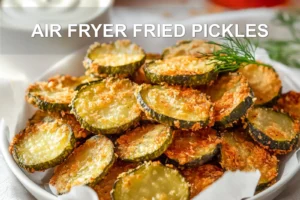 AIR FRYER FRIED PICKLES golden crispy chips with dill and creamy dip in warm light