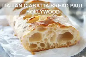 ITALIAN CIABATTA BREAD PAUL HOLLYWOOD rustic torn loaf on white napkin with glass of water