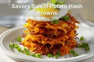 Savory Sweet Potato Hash Browns on white napkin with glass of water and golden crust