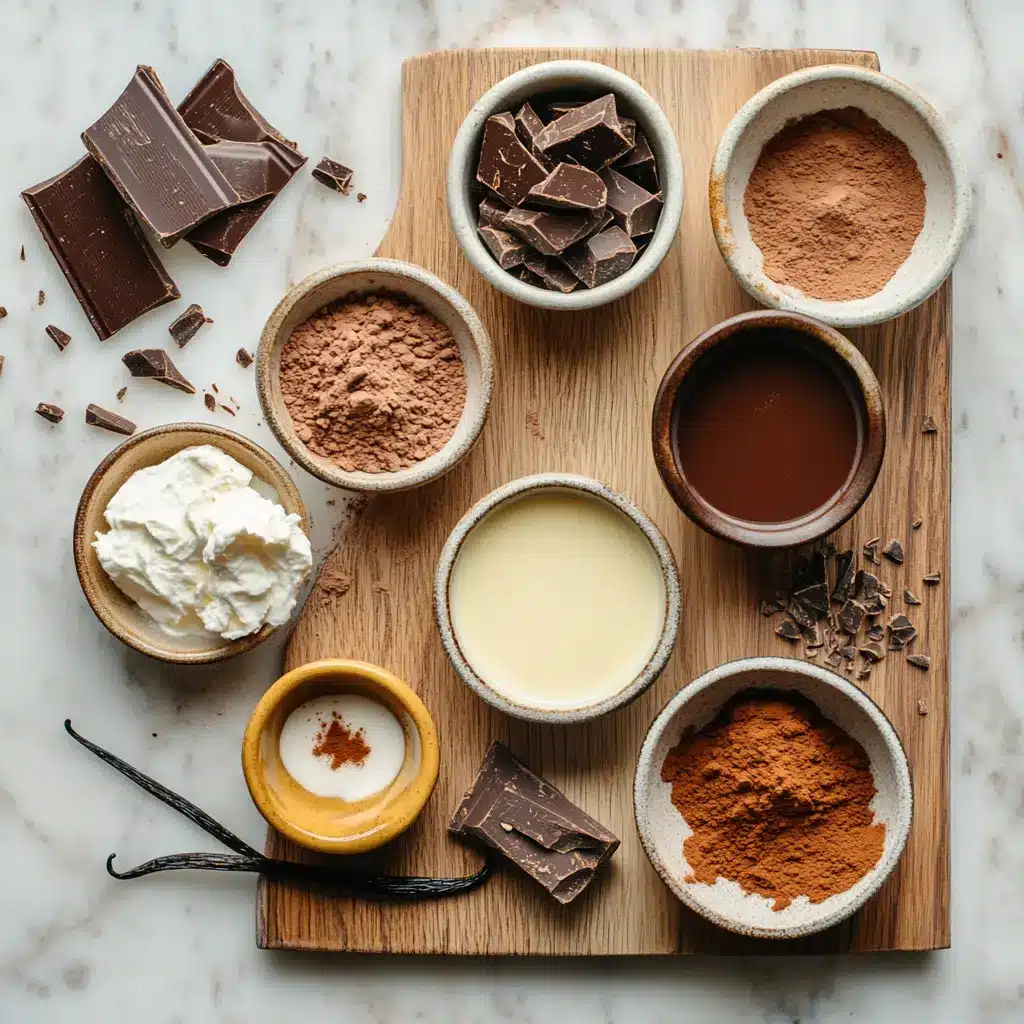 Disneyland Hot Chocolate Recipe: Easy Best Cozy Treat 2 Ingredients laid out for Disneyland's Hot Chocolate Recipe, including whole milk, heavy cream, cocoa powder, and chocolate