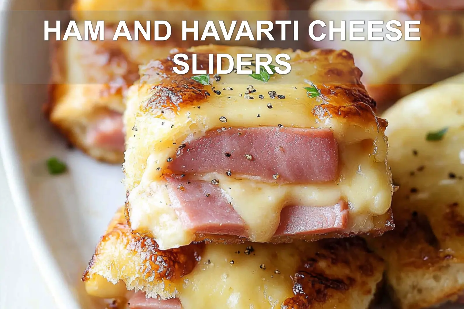 HAM AND HAVARTI CHEESE SLIDERS centered hero view, clean and uncluttered