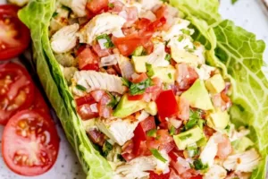 BLTA CHICKEN SALAD LETTUCE WRAP centered hero view, clean and uncluttered