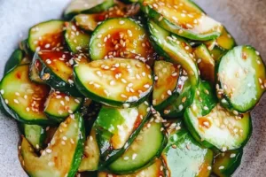 ASIAN CUCUMBER SALAD centered hero view, clean and uncluttered