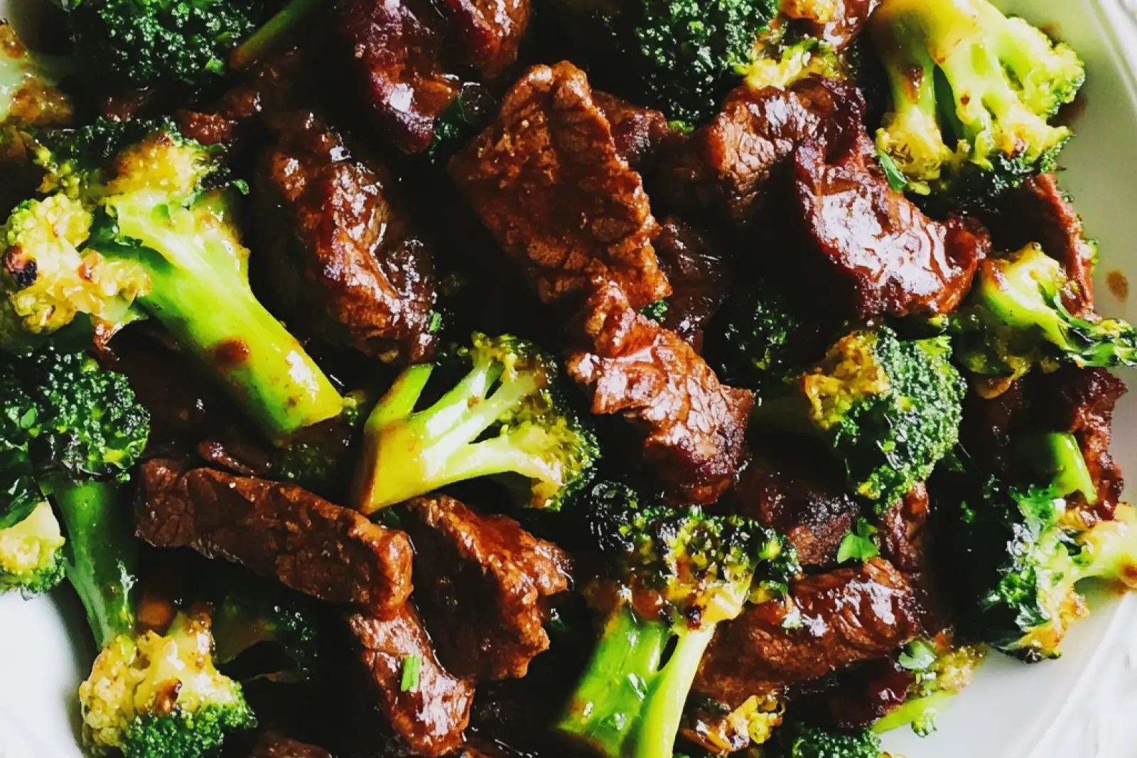 SLOW COOKER BEEF AND BROCCOLI centered hero view, clean and uncluttered