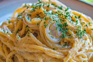CARAMELIZED ONION PASTA recipe, served and ready to eat, easy homemade dinner