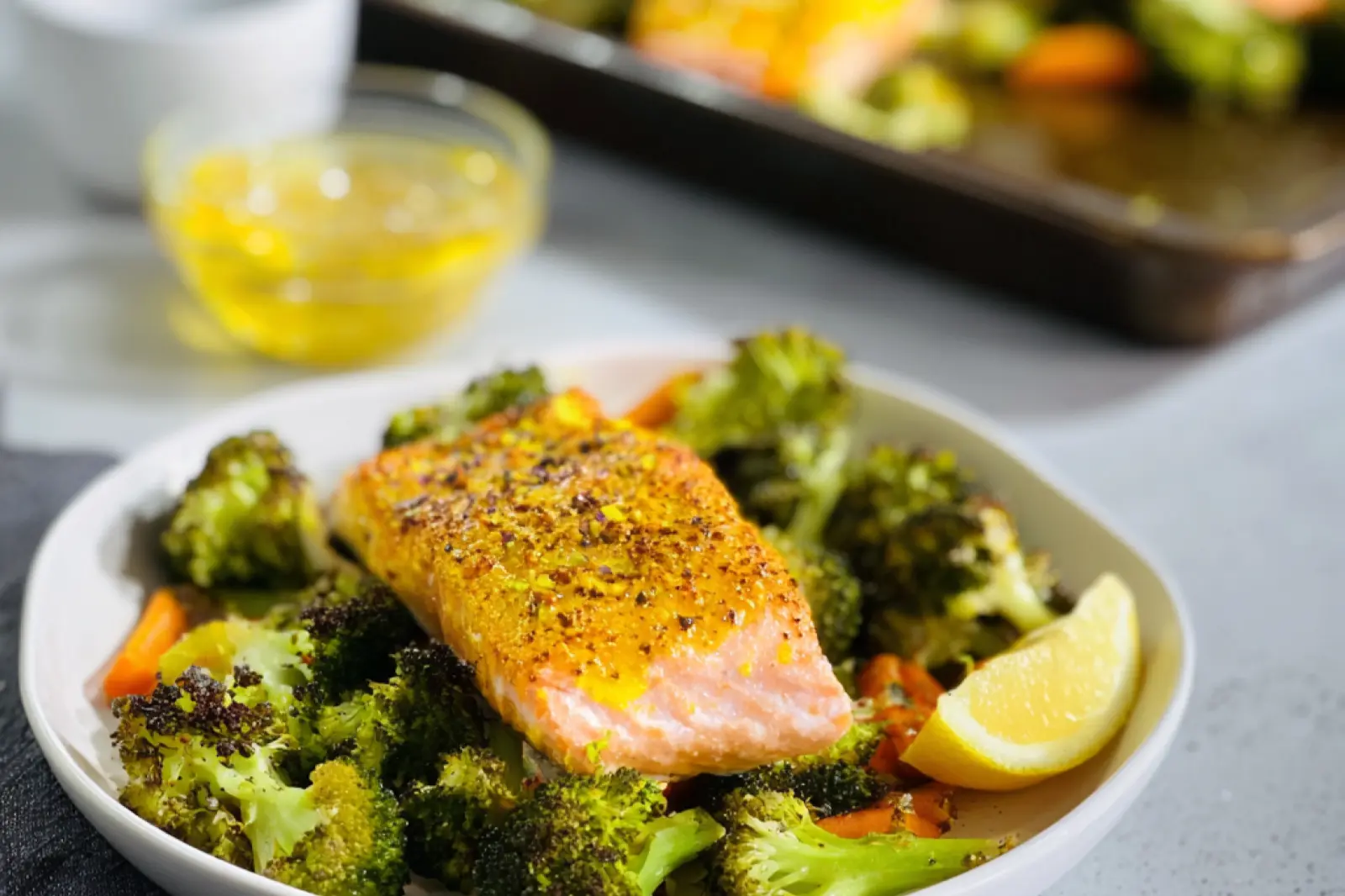 Turmeric Ginger Salmon Roasted Broccoli Bowl recipe, served and ready to eat, easy homemade dinner